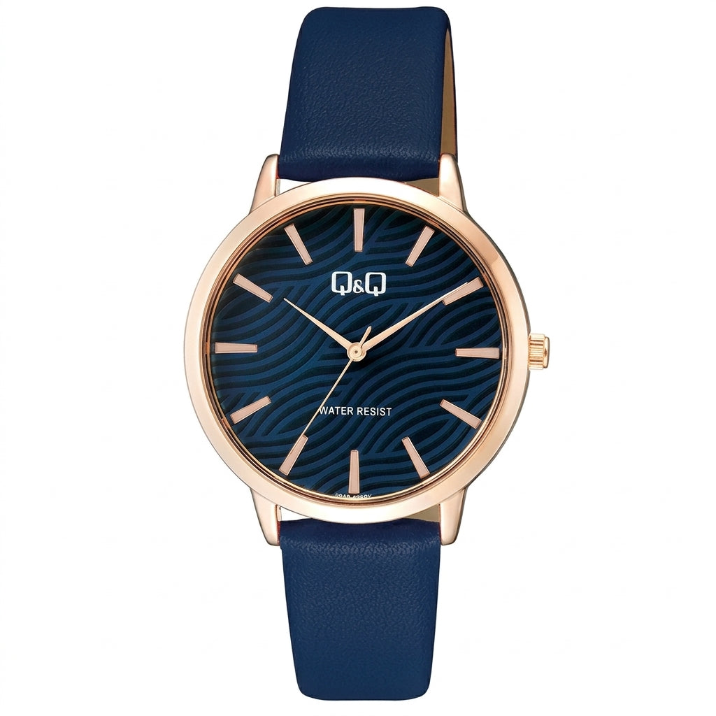 Q&Q Q26B-006PY women's watch with a textured blue dial, rose-gold round case, and deep navy blue synthetic leather strap.